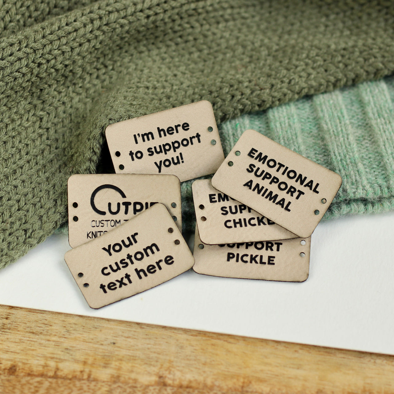 Cream faux leather tag on crochet plushie