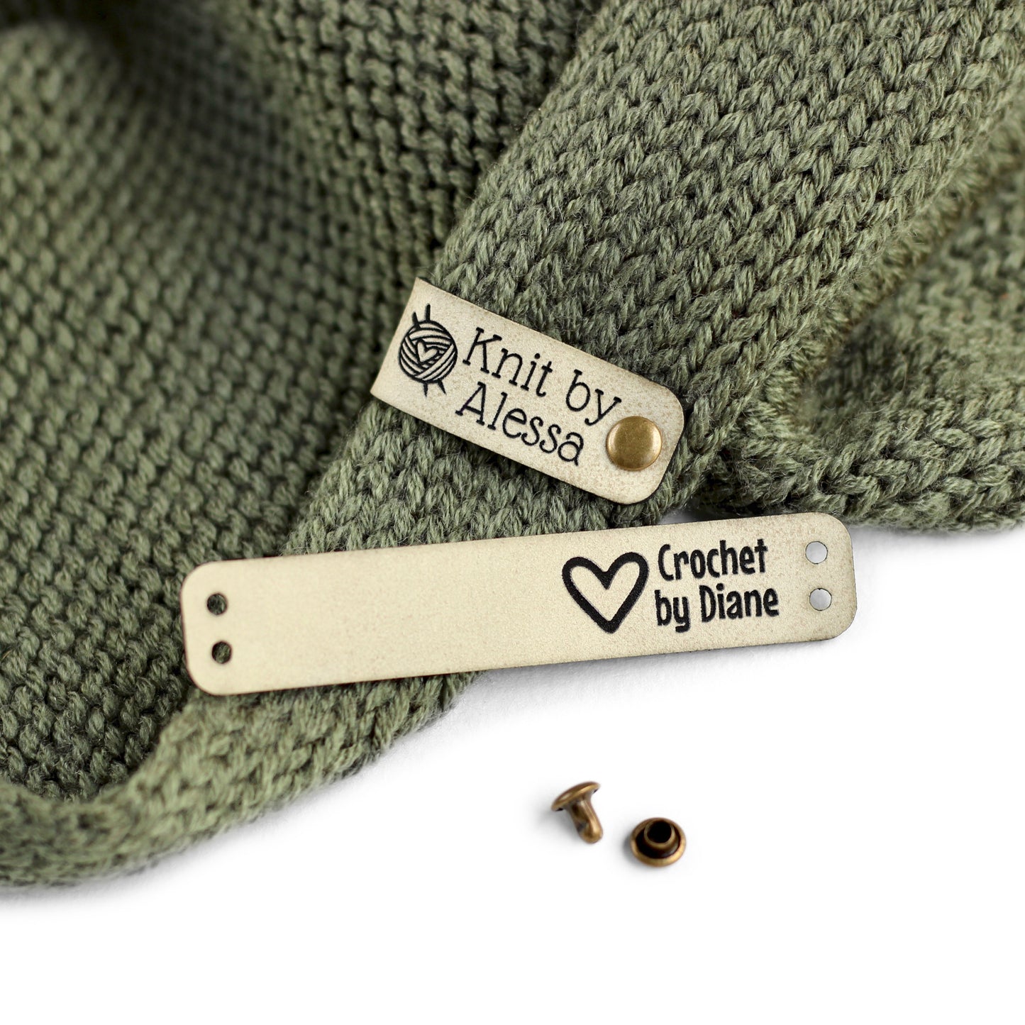 Knitting labels in an off white shade.