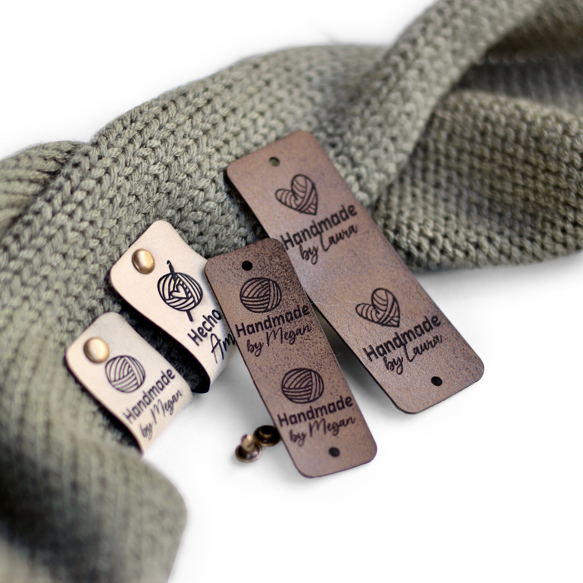 Coffee knitting tags for custom names attached to a knitted item.