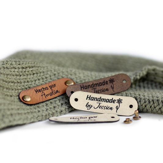 Assorted color tags for knitting, perfect for customization, attached with rivets on both ends.